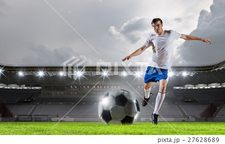 Soccer player at sport arena 27628689
