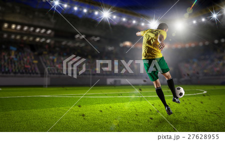 Soccer player at sport arena Soccer player at sport arena 27628955