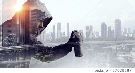 Guy drawing with spray 27629297