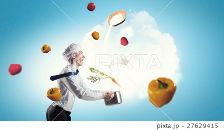 He is cooking something special 27629415