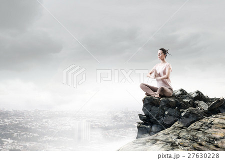 Girl practicing yoga 27630228