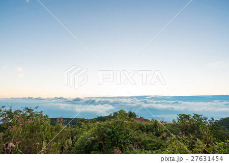 Sunrise on peak of mountain with fog white cloud Sunrise on peak of mountain with fog white cloud 27631454