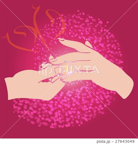 Groom puts the ring on the bride hand. Groom puts the ring on the bride hand. 27643049