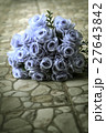 bouquet of blue rose lying on grey road 27643842