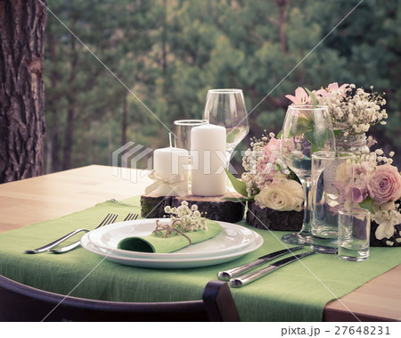 Wedding table setting in rustic style. 27648231
