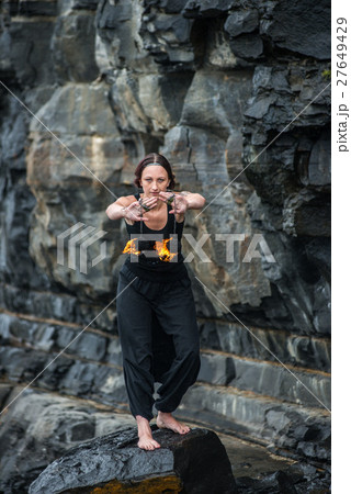 Fire show girl with flaming torches Fire show girl with flaming torches 27649429