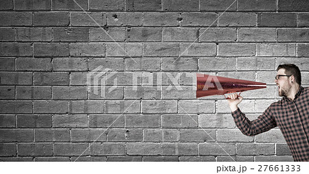 Hipster man shout in trumpet Hipster man shout in trumpet 27661333