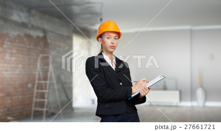 Woman designer in interior Woman designer in interior 27661721
