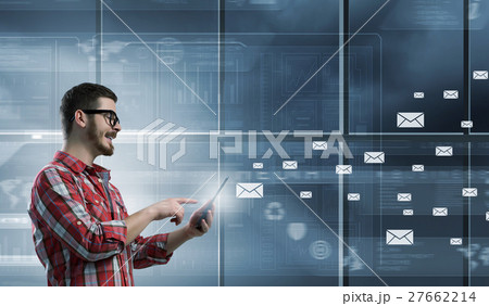 Guy using tablet pc Guy using tablet pc 27662214