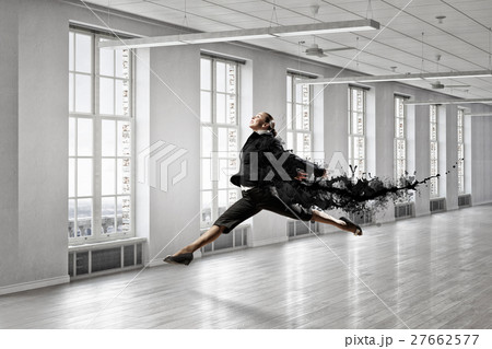 Dancing businesswoman in office Dancing businesswoman in office 27662577