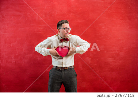 Young beautiful man with abstract heart Young beautiful man with abstract heart 27677118