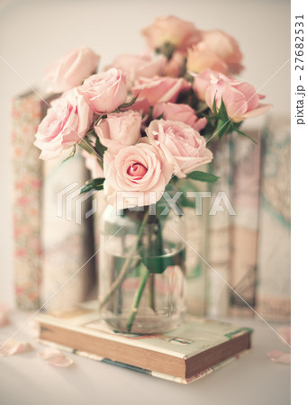 Soft pink roses and vintage books 27682531