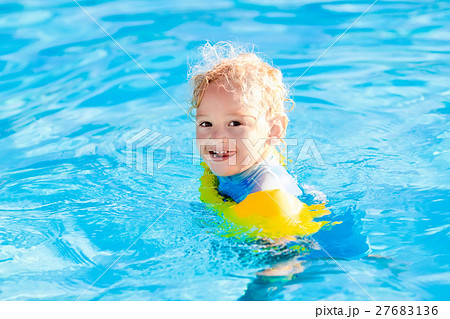 Little child in swimming pool 27683136