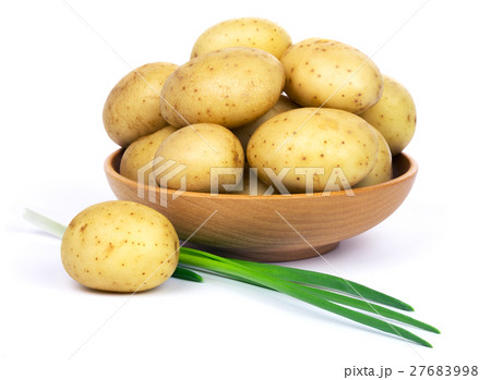 Raw potatoes and green onions Raw potatoes and green onions 27683998