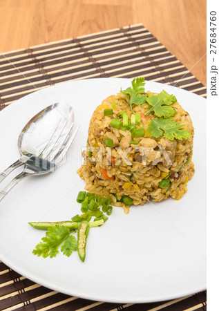 Fried rice yellow curry with pork on bamboo mat Fried rice yellow curry with pork on bamboo mat 27684760