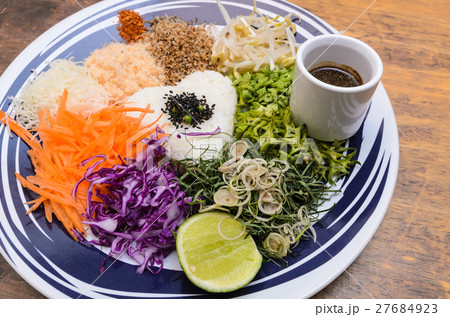 Nasi kerabu - Rice with herbs and vegetables Nasi kerabu - Rice with herbs and vegetables 27684923