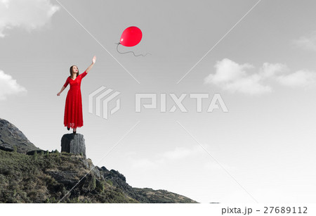 Woman in passionate red dress Woman in passionate red dress 27689112