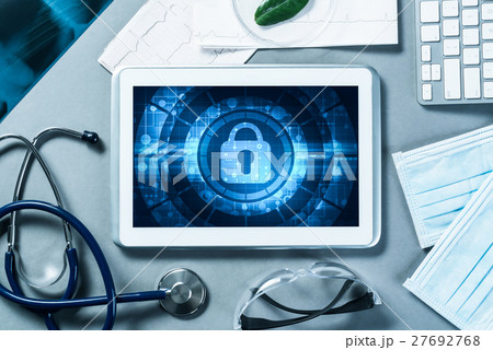 Web security and technology concept with tablet pc on table Web security and technology concept with tablet pc on table 27692768