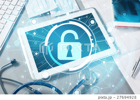 Top view of doctor workplace with tablet pc and medicine tools on wooden table 27694928