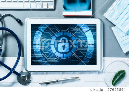 Web security and technology concept with tablet pc on table 27695844