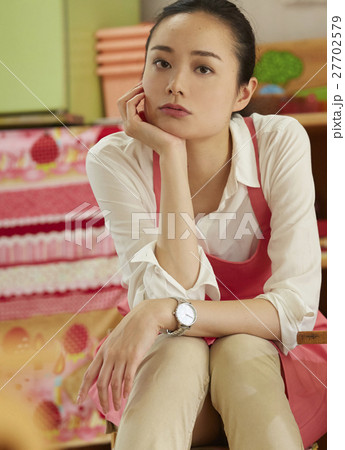 エプロン姿の女性の写真素材