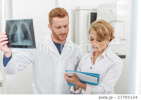 Working atmosphere among busy doctors Working atmosphere among busy doctors 27705134