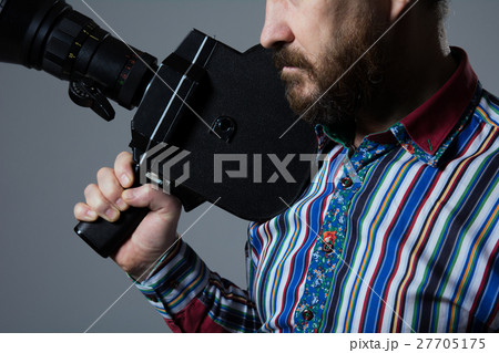 Bearded Man Movie Camera thoughtfully 27705175