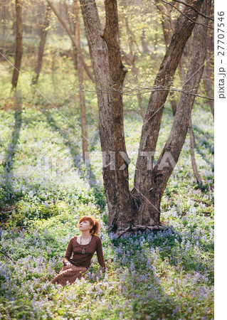 Beautiful young woman in the forest 27707546