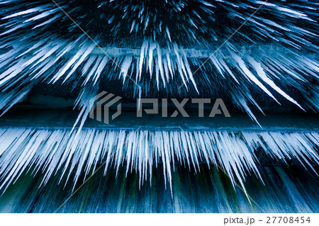 Lot of sharp and long icicles Lot of sharp and long icicles 27708454