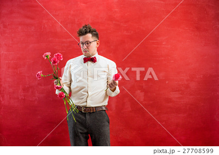 Young funny man with broken bouquet 27708599