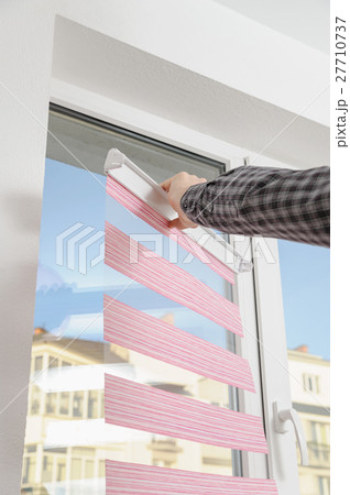 Installing fabric roller blinds. Installing fabric roller blinds. 27710737