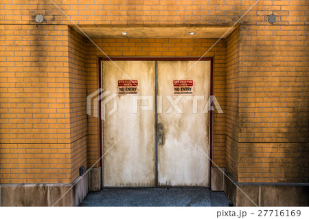 Grunge brick wall and door with no entry sign. 27716169