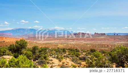 Stone mountains in valley. 27716371