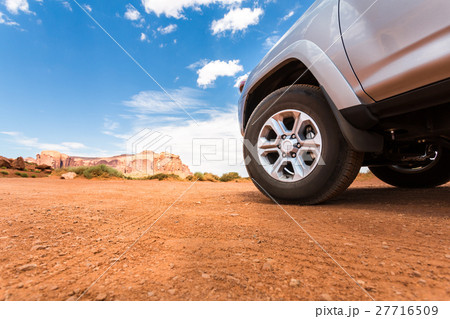 Truck in desert with mountains on the background. Truck in desert with mountains on the background. 27716509