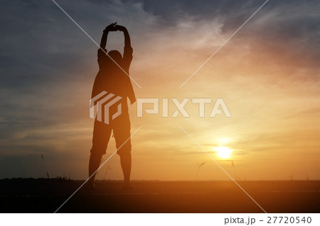 Silhouette woman lifestyle relax at sunset 27720540