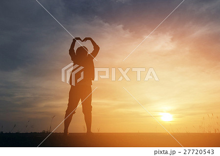 Silhouette woman lifestyle relax at sunset 27720543