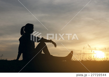 Silhouette woman lifestyle relax at sunset 27720544