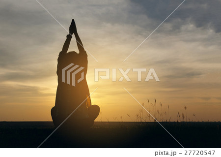 Silhouette woman lifestyle relax at sunset 27720547
