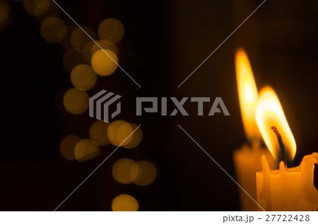 Lighting a candle in the night Lighting a candle in the night 27722428