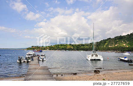 Boats docking at tourist pier in Lombok Boats docking at tourist pier in Lombok 27727659