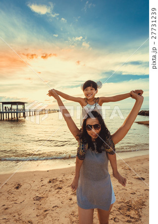 mother and child daughter outdoors in summer 27731239