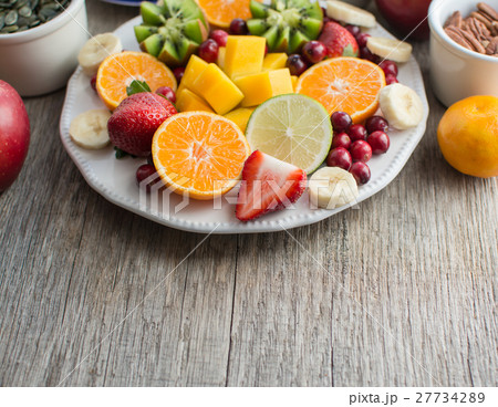 Vegan breakfast: variety of fruits Vegan breakfast: variety of fruits 27734289