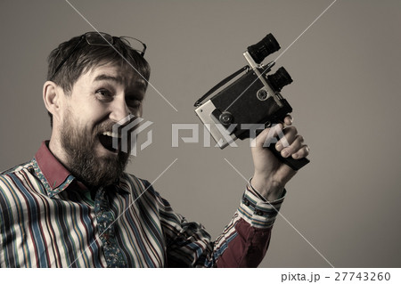 Happy bearded man old retro film camera Happy bearded man old retro film camera 27743260