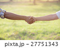Two people Handshake in the garden fields 27751343