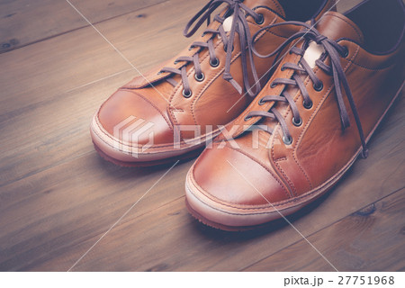 A pair of brown leather shoes with vintage 27751968