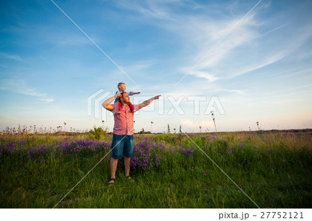 Cute boy with dad playing outdoor 27752121