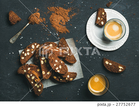 Biscotti with sea salt and almonds, two glasses of 27752677