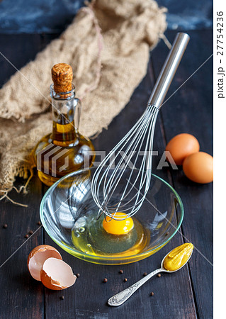 Cooking homemade mayonnaise sauce. 27754236