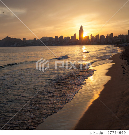 Golden sunset on the Poniente beach in Benidorm Golden sunset on the Poniente beach in Benidorm 27754649