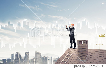 Engineer man standing on roof and looking in spyglass. Mixed med 27757501